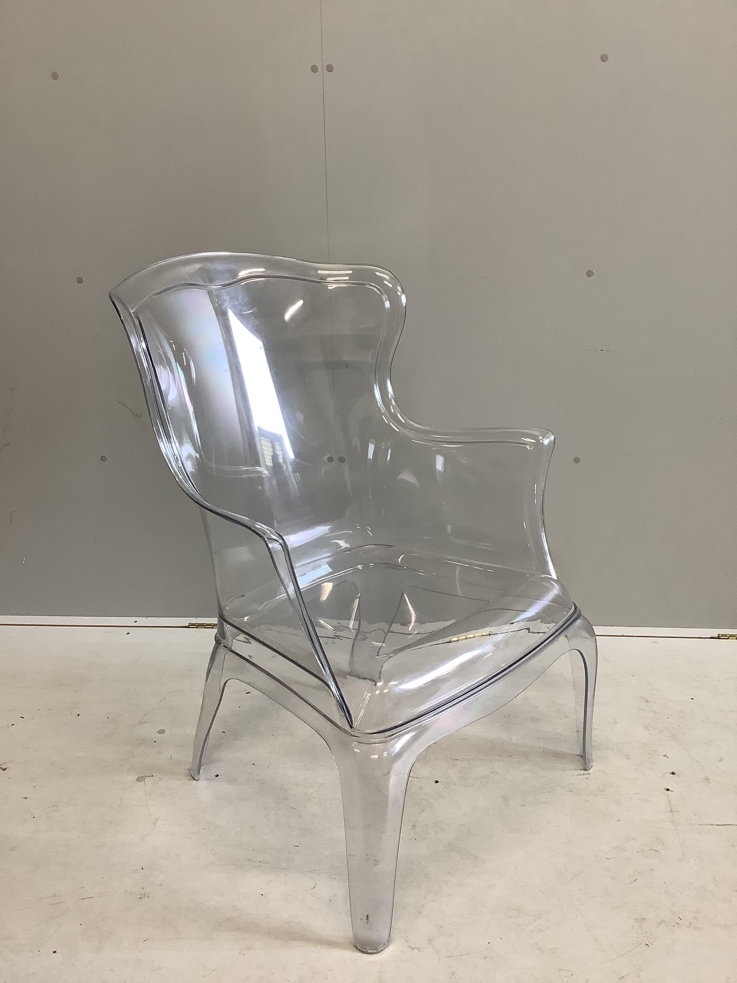 A Pedrali Pasha 660 polycarbonate 'ghost' armchair, width 70cm, depth 80cm, height 98cm